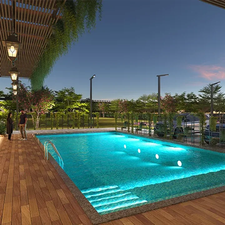 Sattva Ekatra swimming pool with deck at the clubhouse